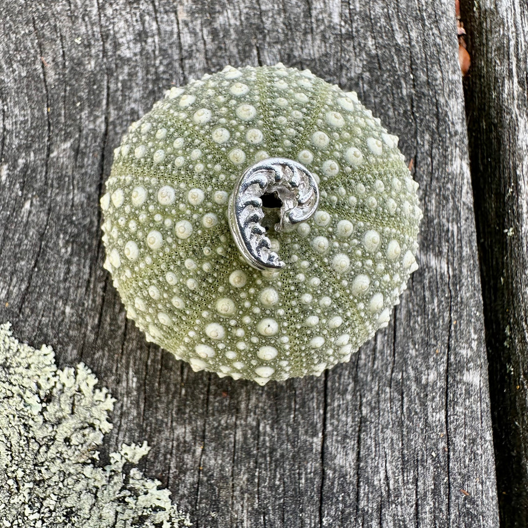 Silver fern bead