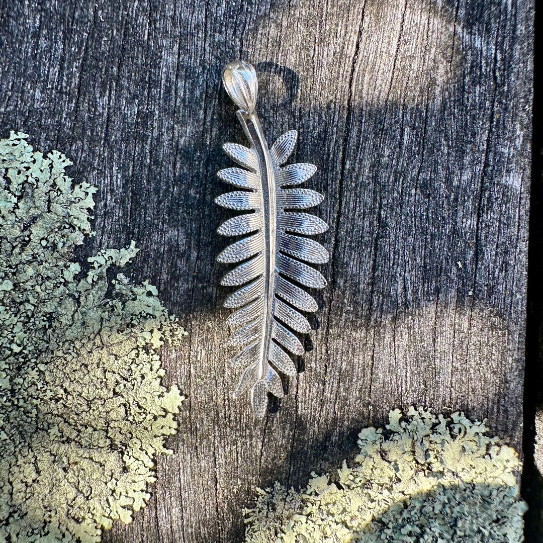 silver fern pendant