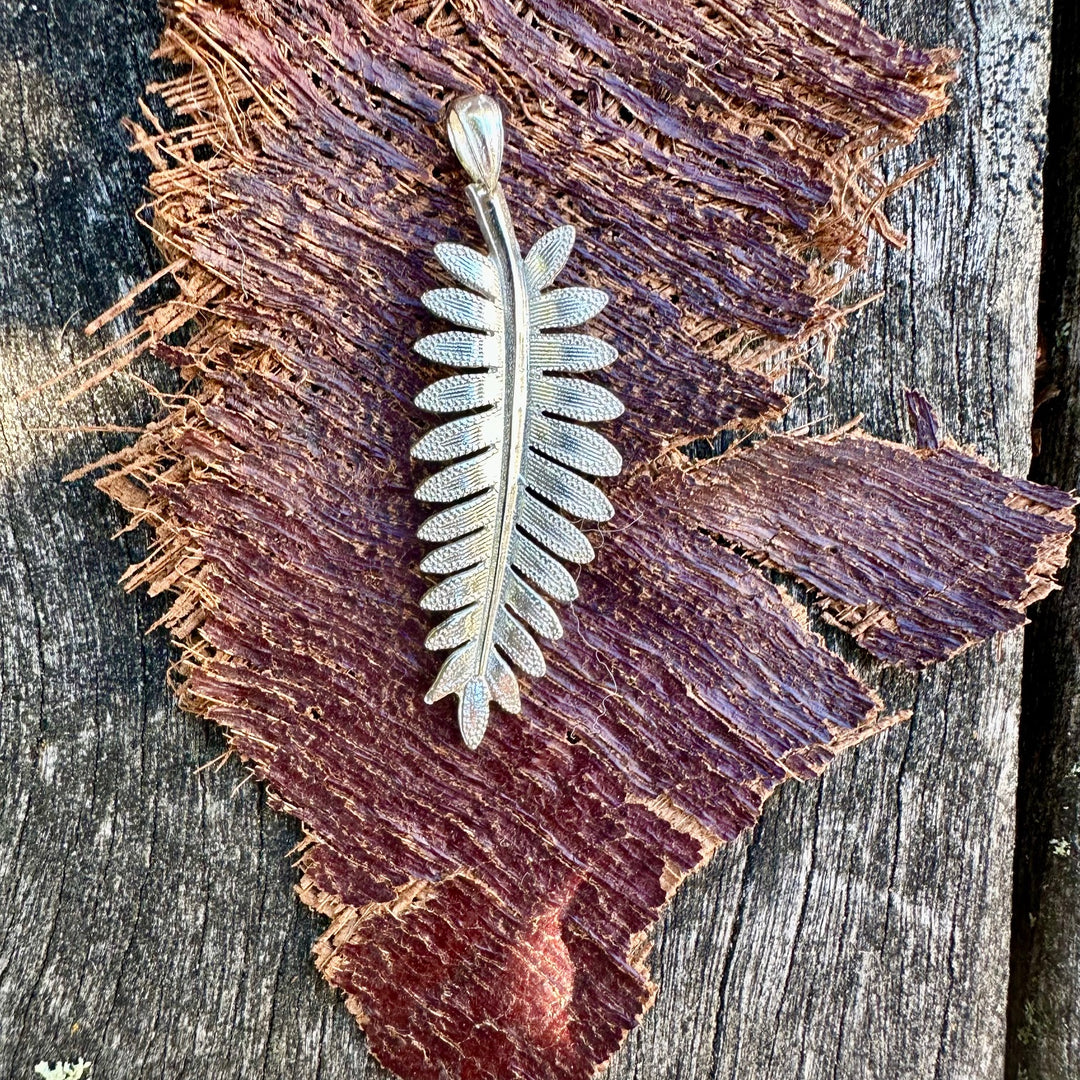 silver fern pendant