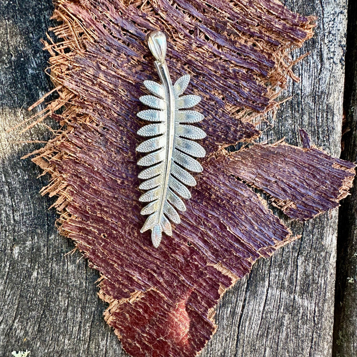 silver fern pendant