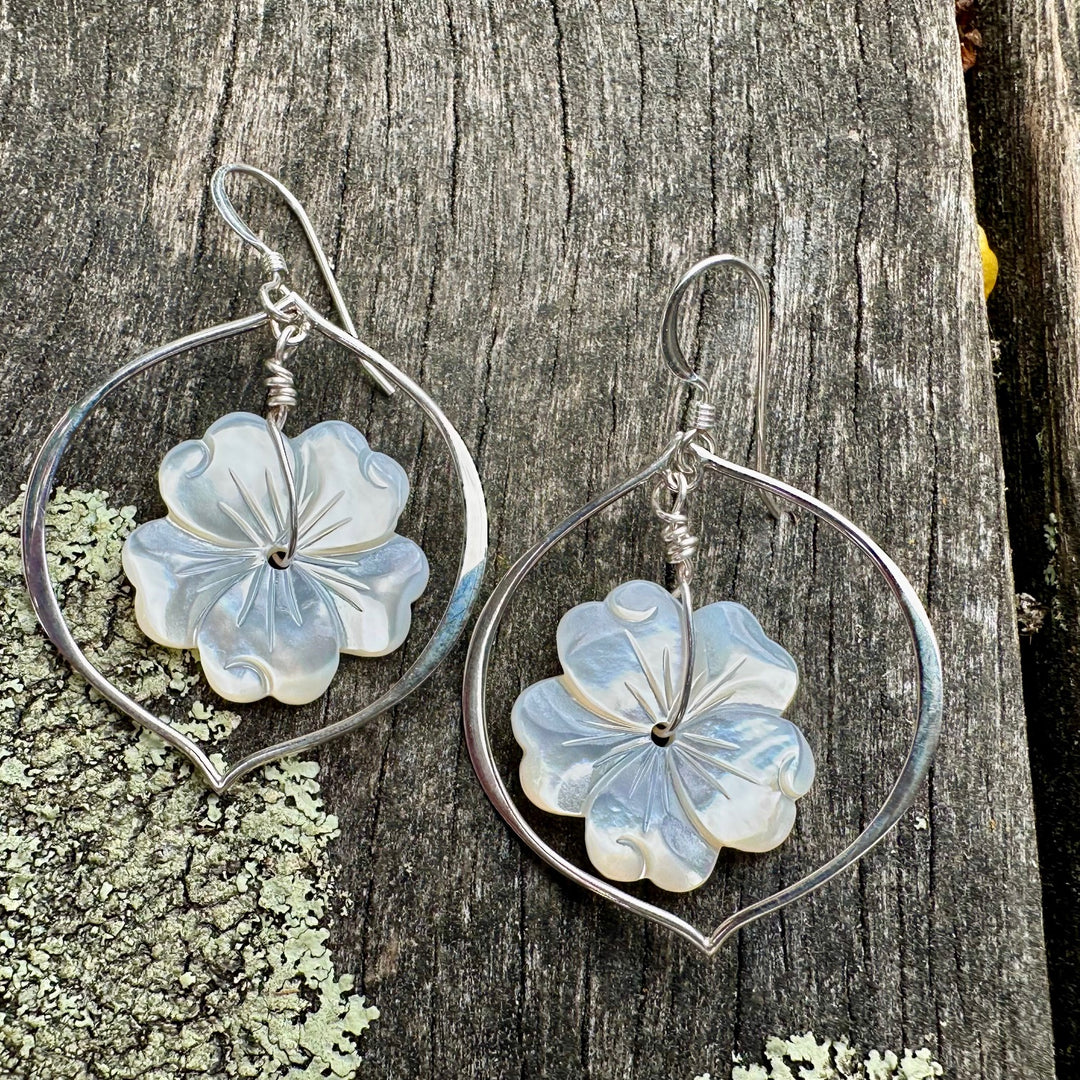 Large carved mother of pearl earrings