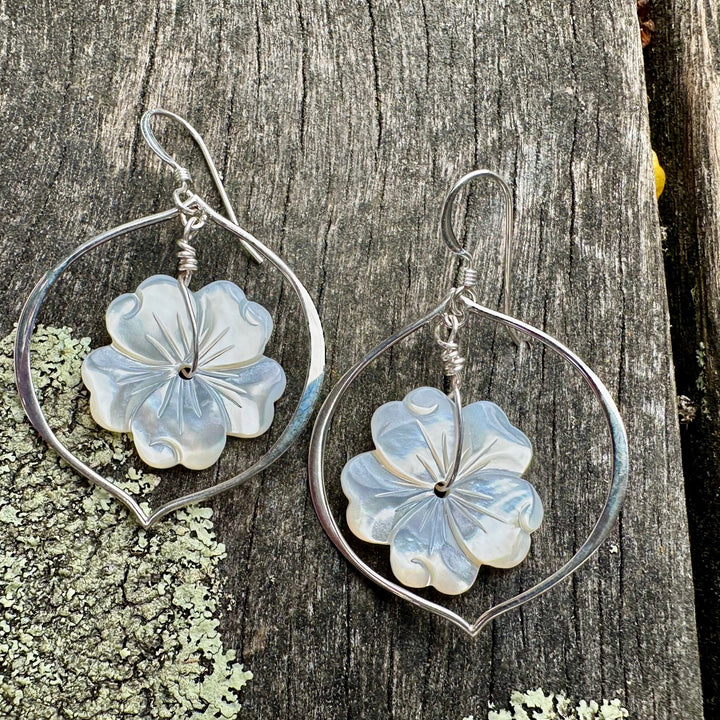 Large carved mother of pearl earrings