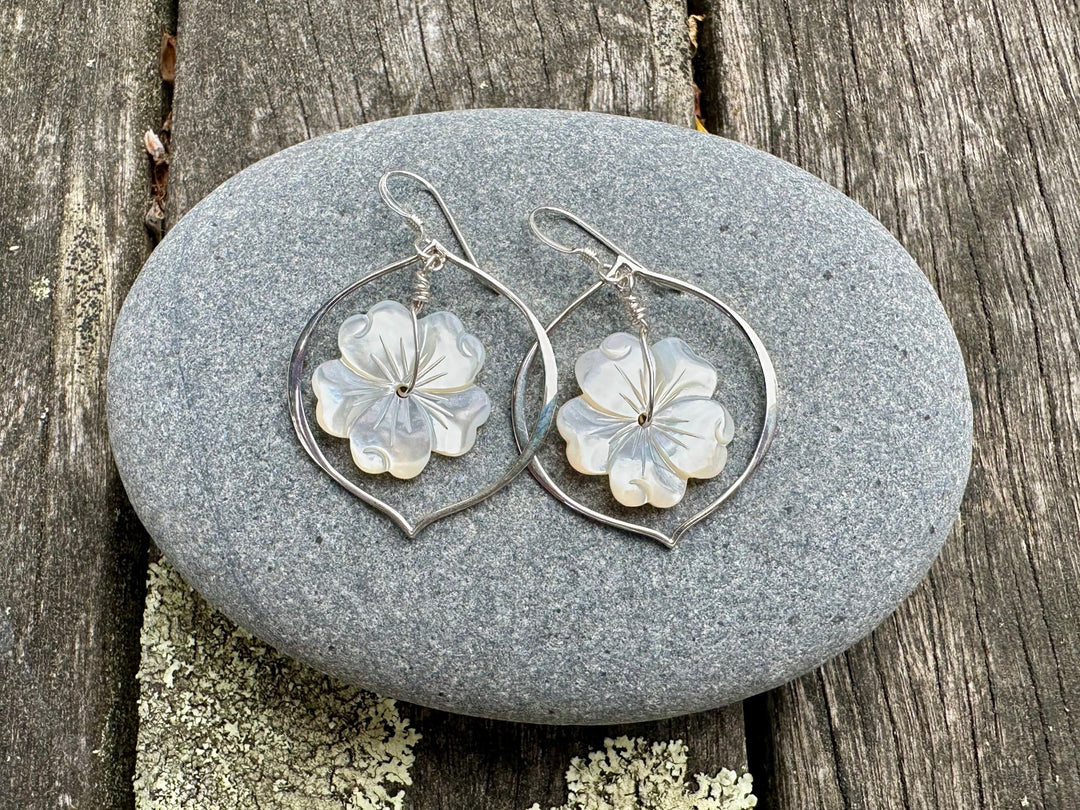 Large carved mother of pearl earrings