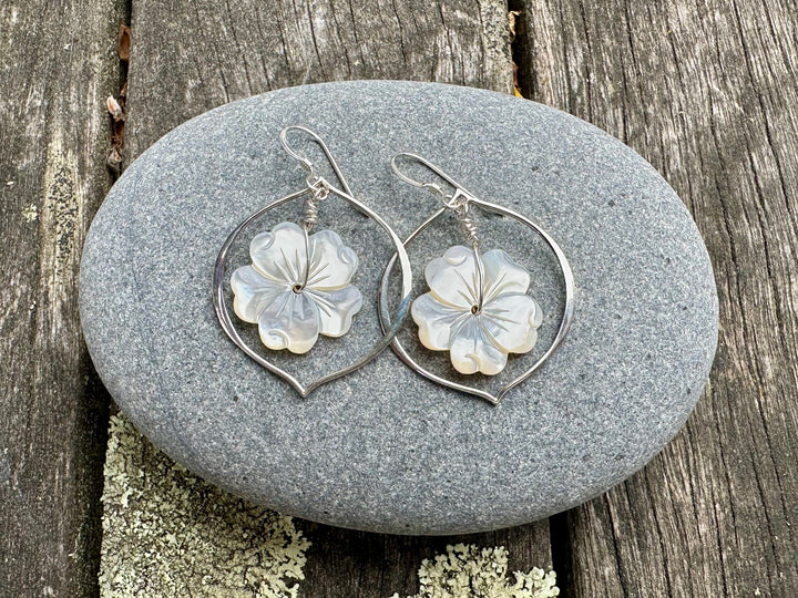 Large carved mother of pearl earrings