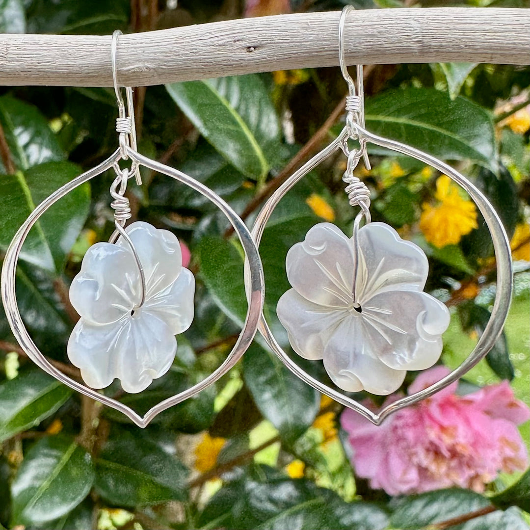 Large carved mother of pearl earrings