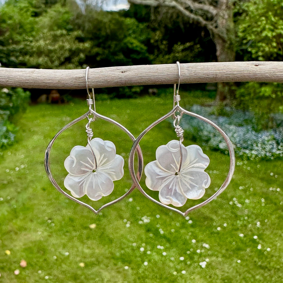 Large carved mother of pearl earrings