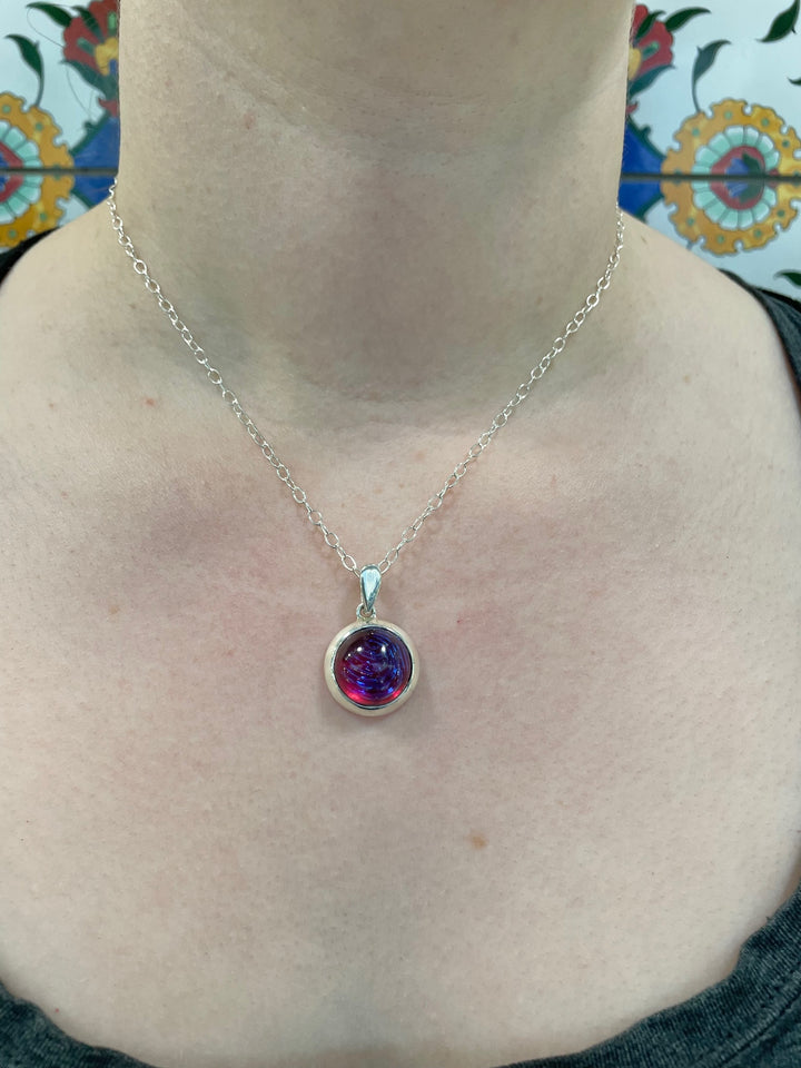 Vintage Fingerprint dragons breath pendant