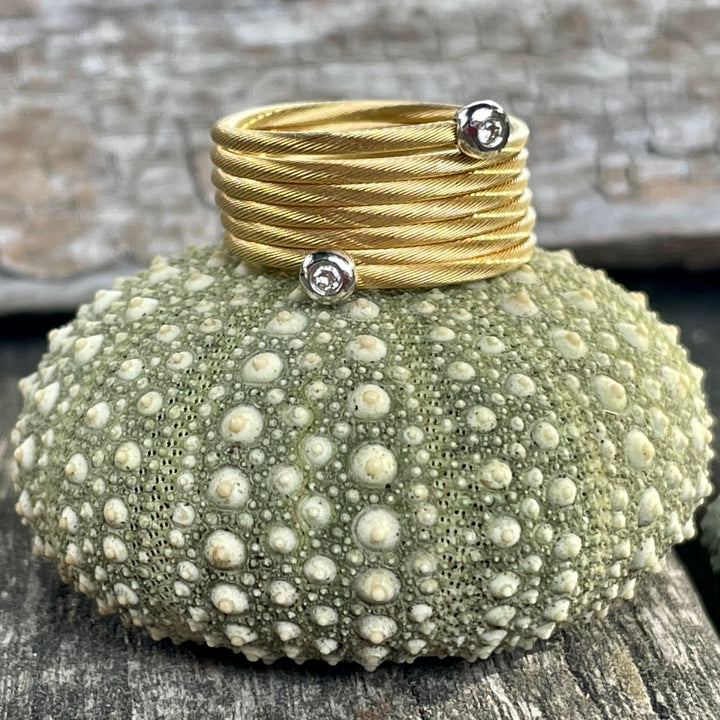 18 carat gold and diamond spiral ring