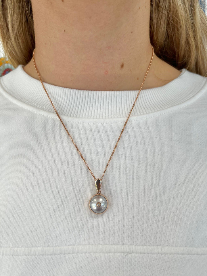 9ct Gold White Freshwater Pearl and Diamond pendant