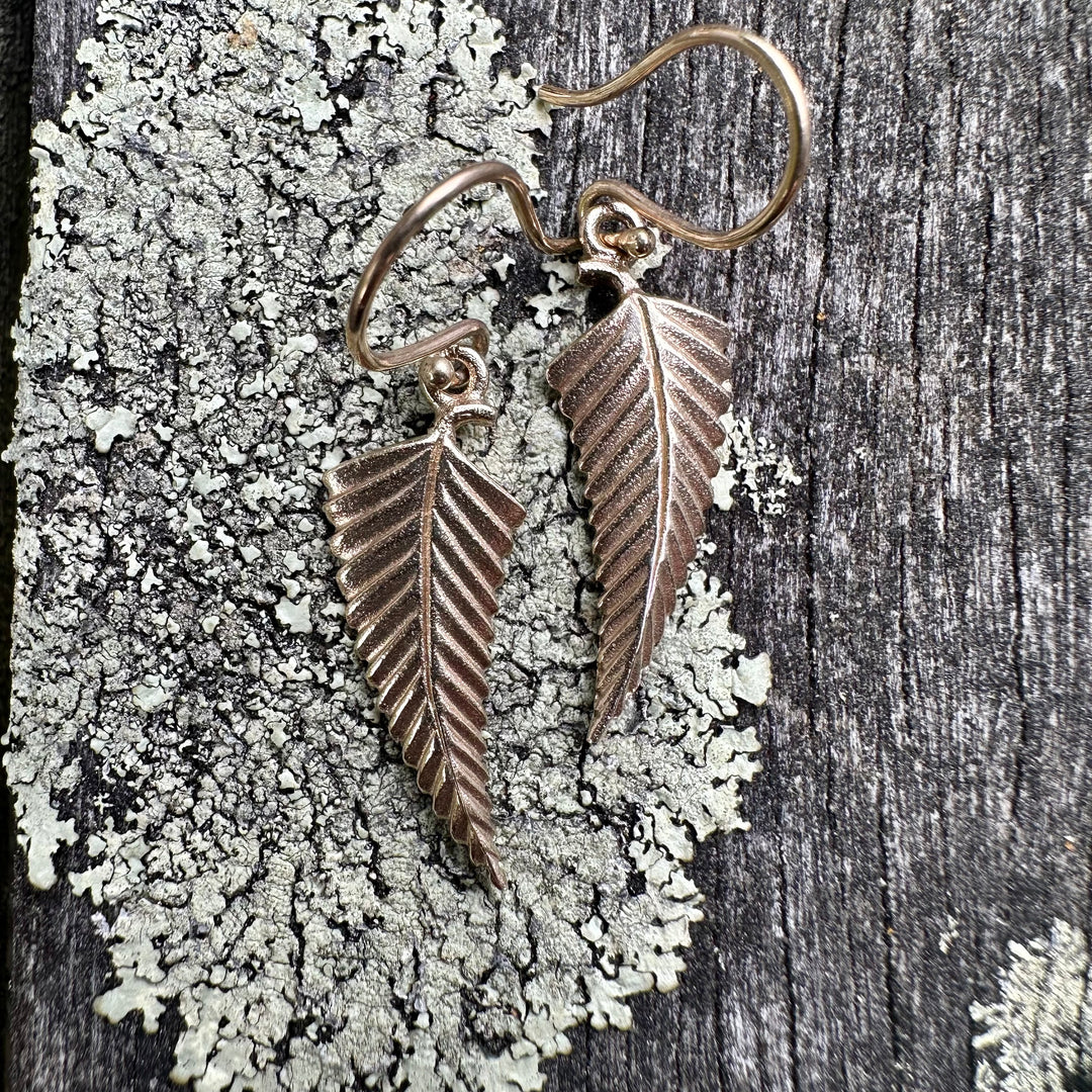 9CY Matched silver fern earrings