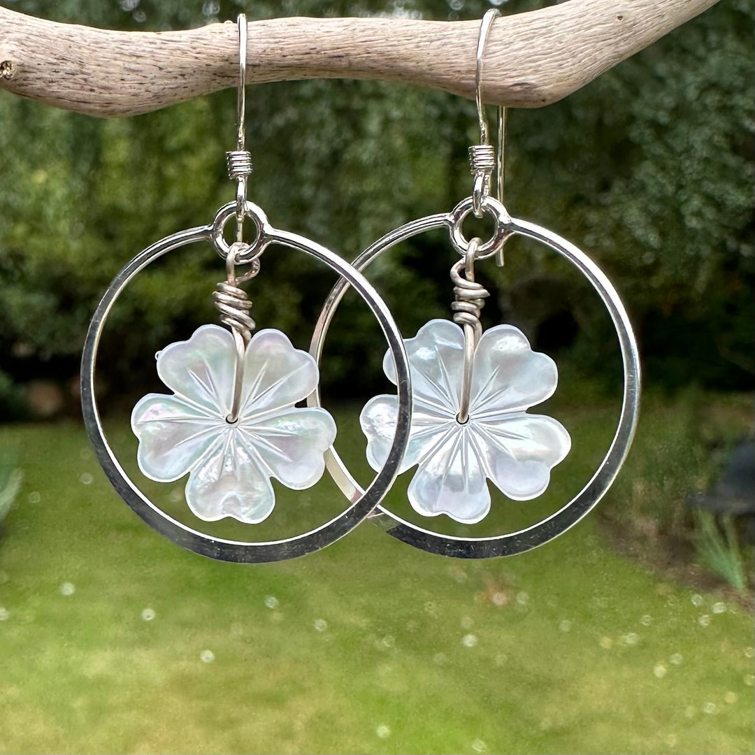 Carved mother of pearl flower earrings