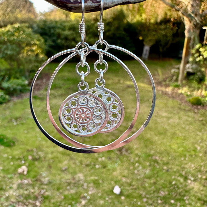 Rose windows in large hoops earrings