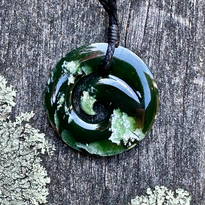 Small New Zealand greenstone koru