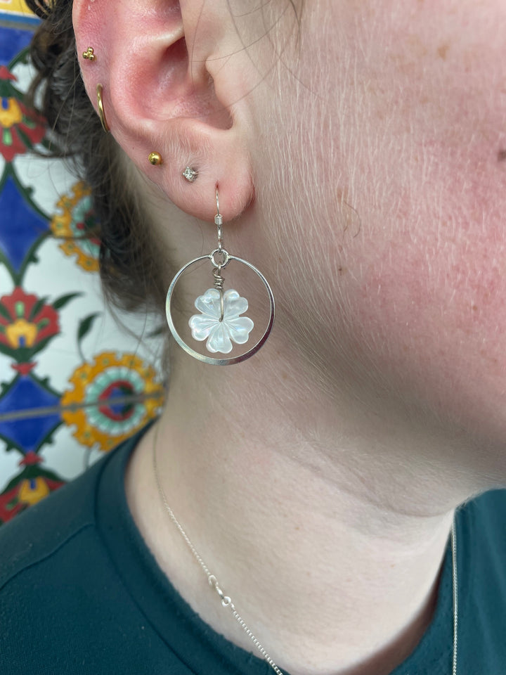 Carved mother of pearl flower earrings