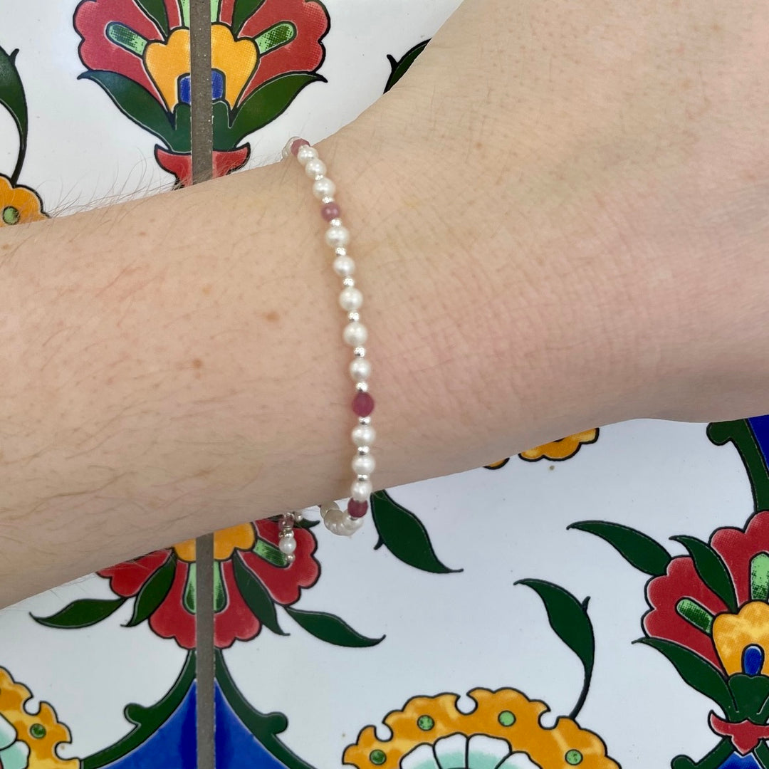 Tiny white freshwater pearl with tourmaline bracelet