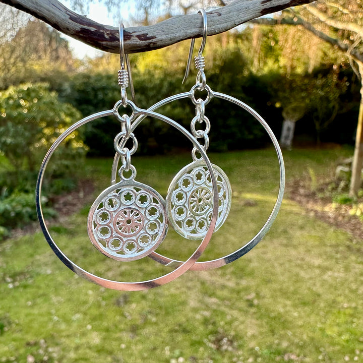 Rose windows in large hoops earrings