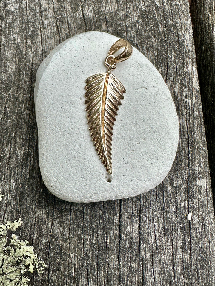 9 carat gold silver fern pendant