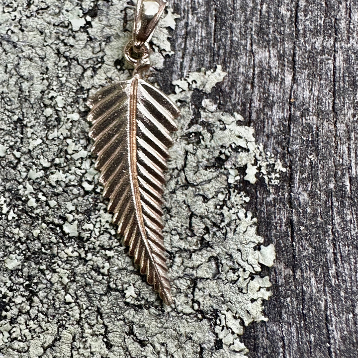 9 carat gold silver fern pendant