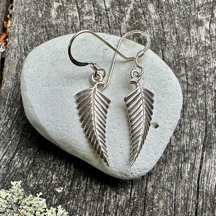 Small silver fern earrings