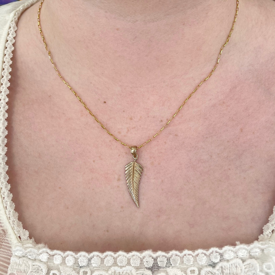 9 carat gold silver fern pendant