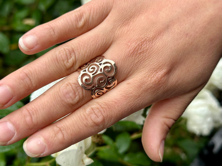 Koru swirl ring in 9 carat rose gold
