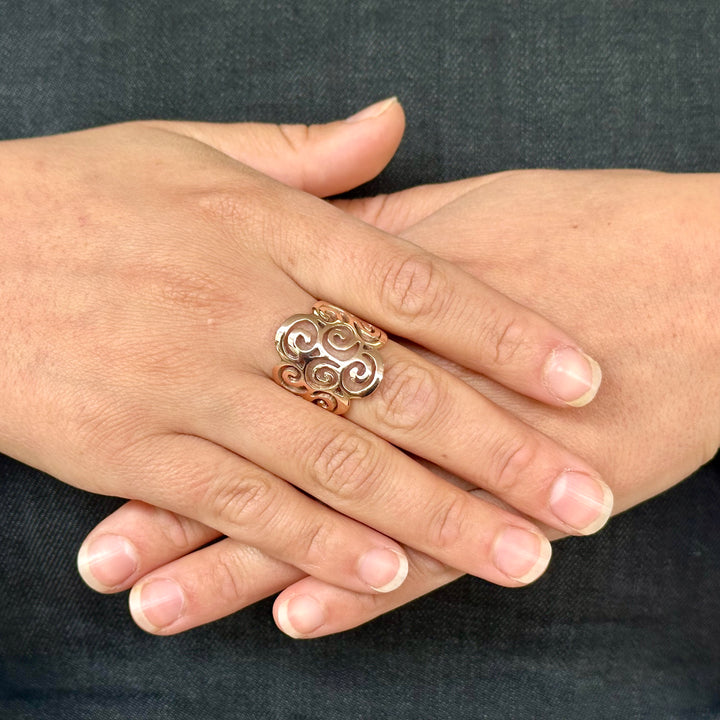 Koru swirl ring in 9 carat rose gold