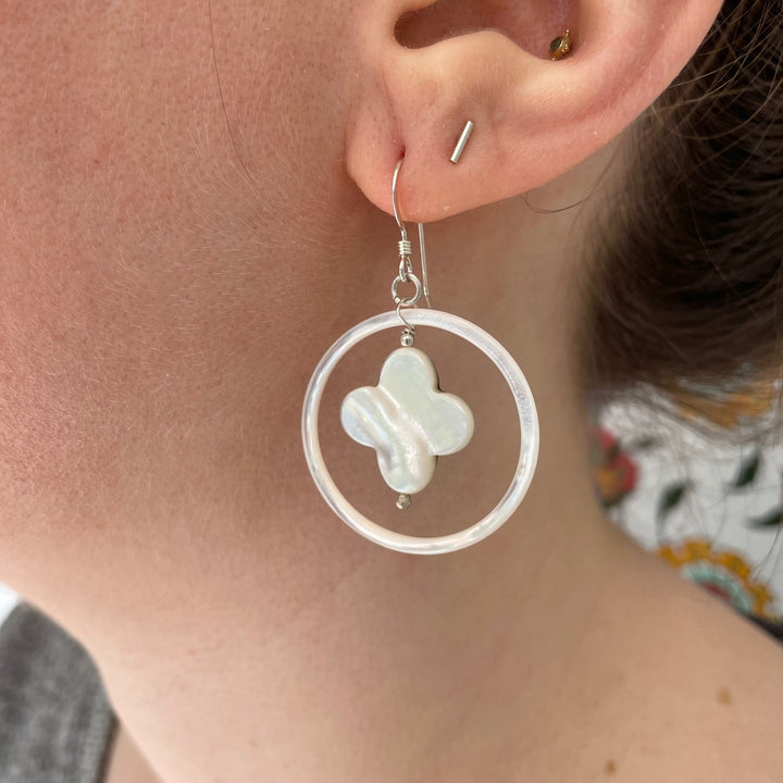 White mother of pearl in hoop earrings