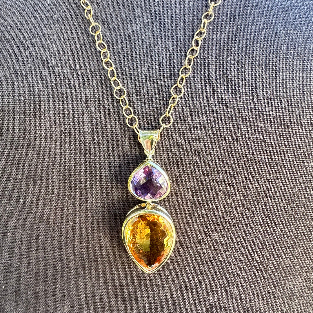 41.34ct citrine & amethyst pendant