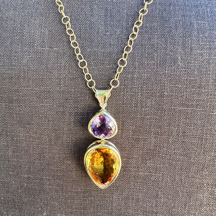 41.34ct citrine & amethyst pendant