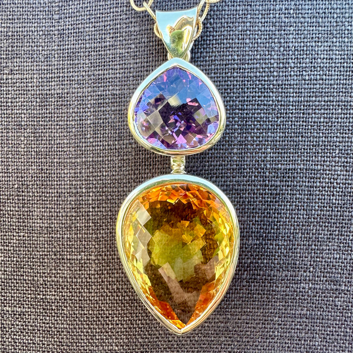 41.34ct citrine & amethyst pendant