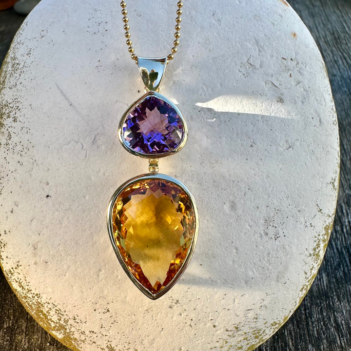 41.34ct citrine & amethyst pendant