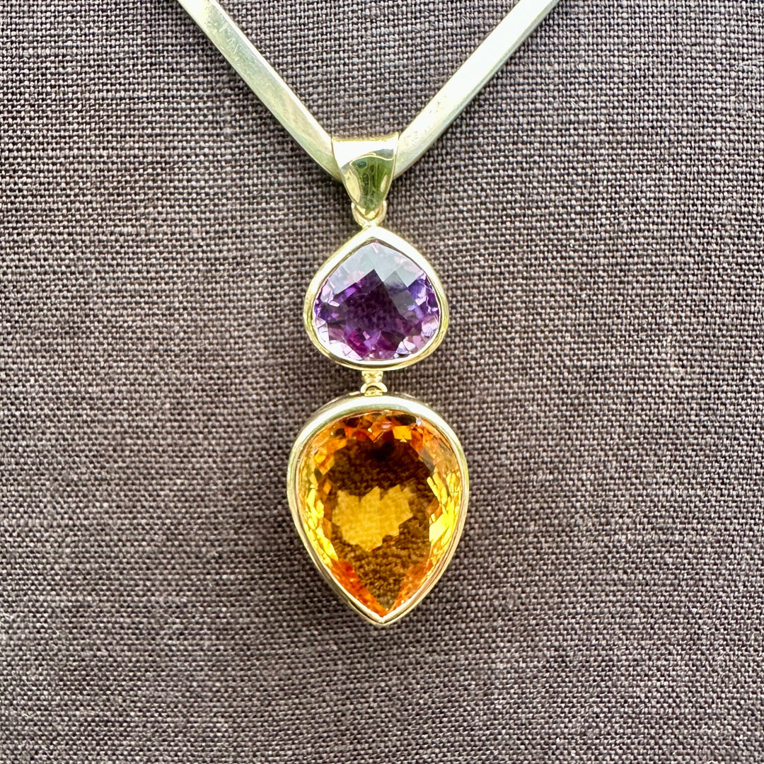 41.34ct citrine & amethyst pendant