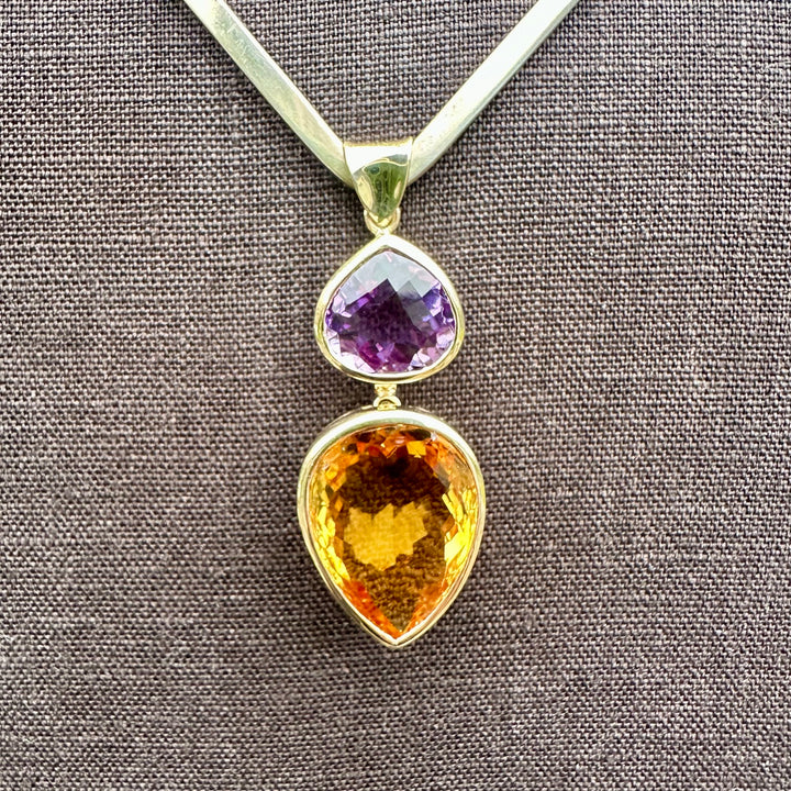 41.34ct citrine & amethyst pendant