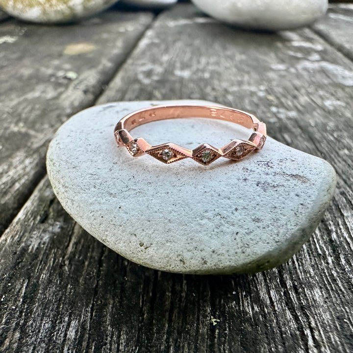 Wee 9 carat rose gold & diamond ring