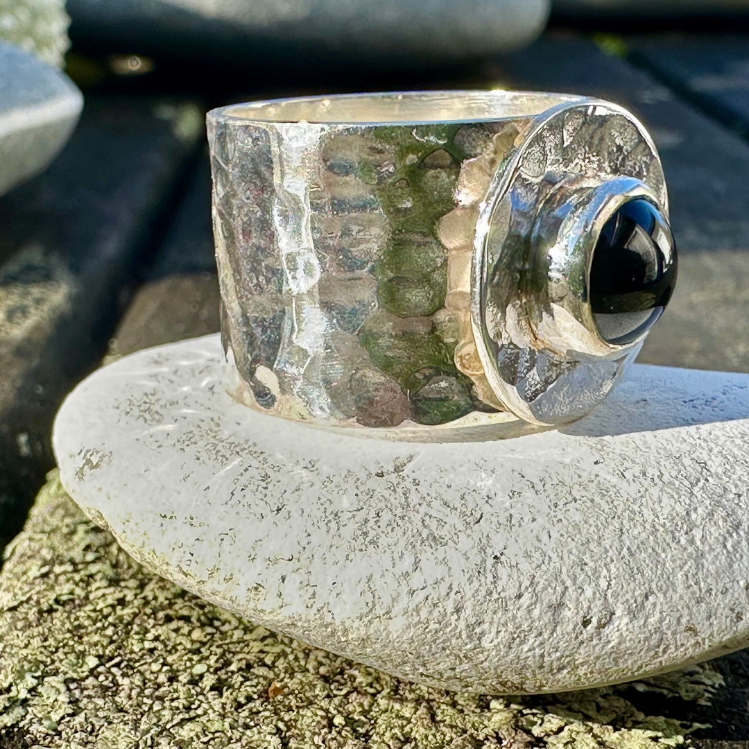 Black onyx in a hammered band