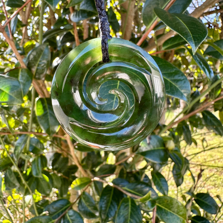 Dark New Zealand greenstone double koru
