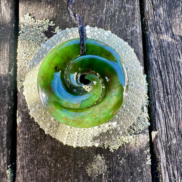 Dark New Zealand greenstone double koru