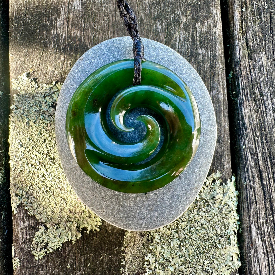 Dark New Zealand greenstone double koru