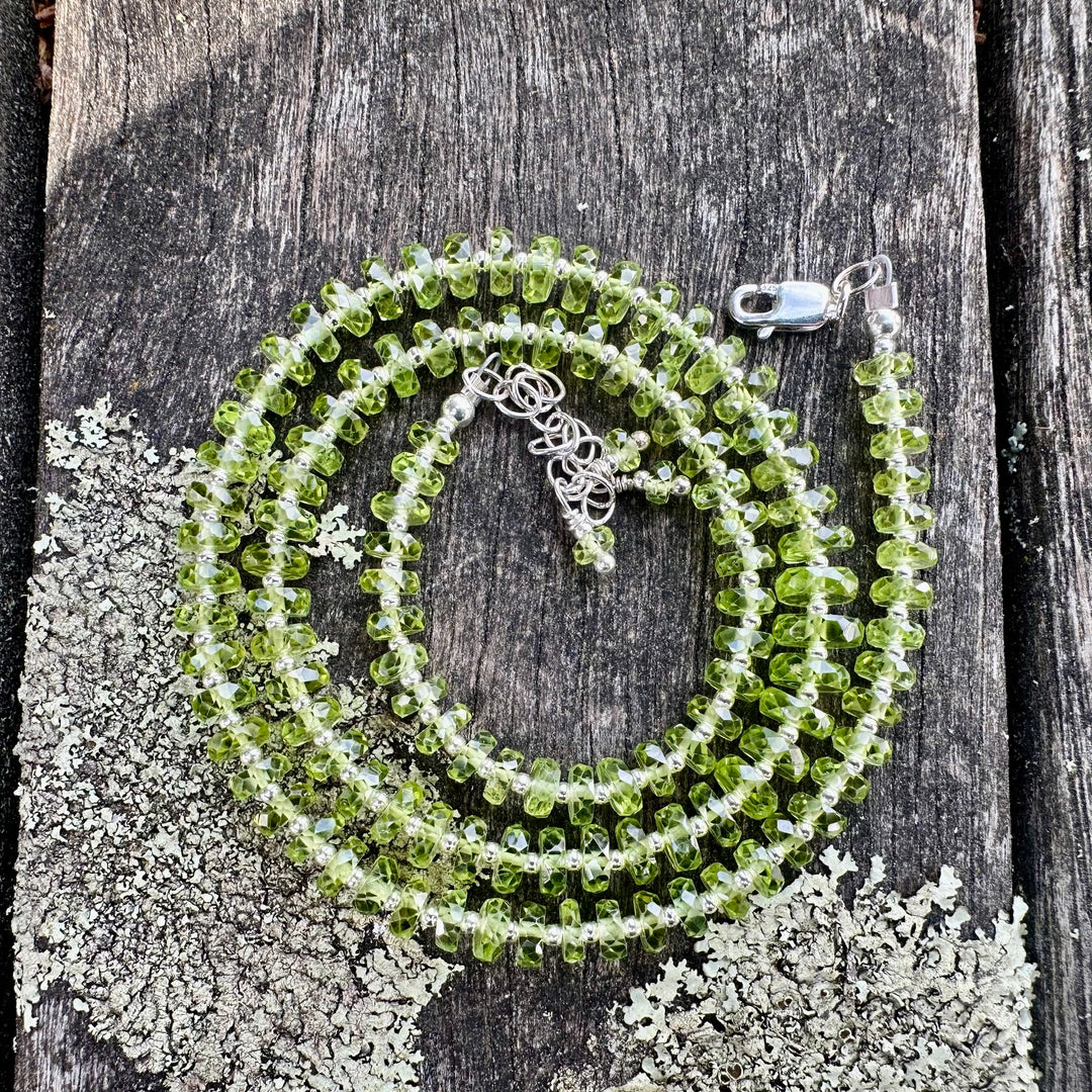 Faceted peridot rondel necklace