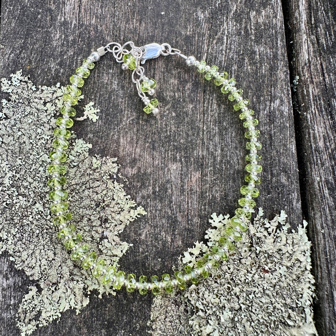 Faceted peridot rondel bracelet