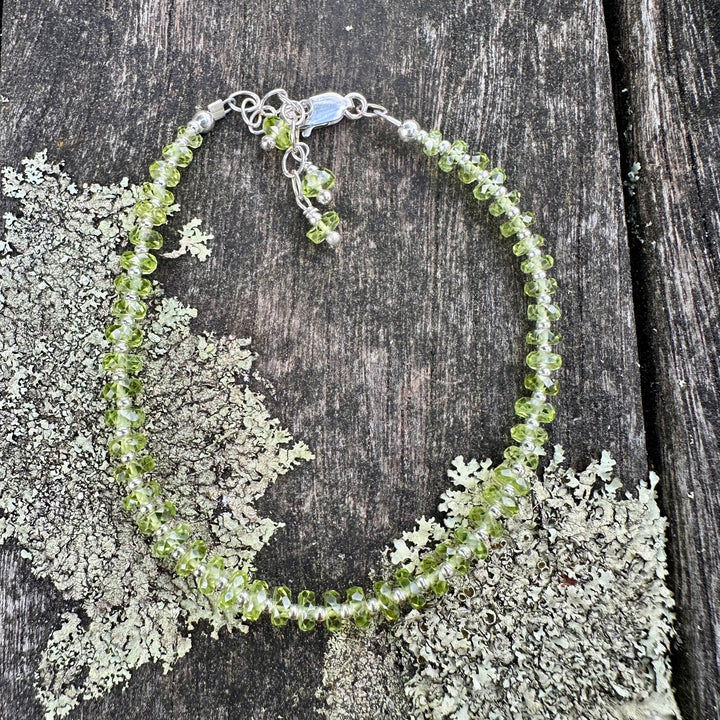 Faceted peridot rondel bracelet