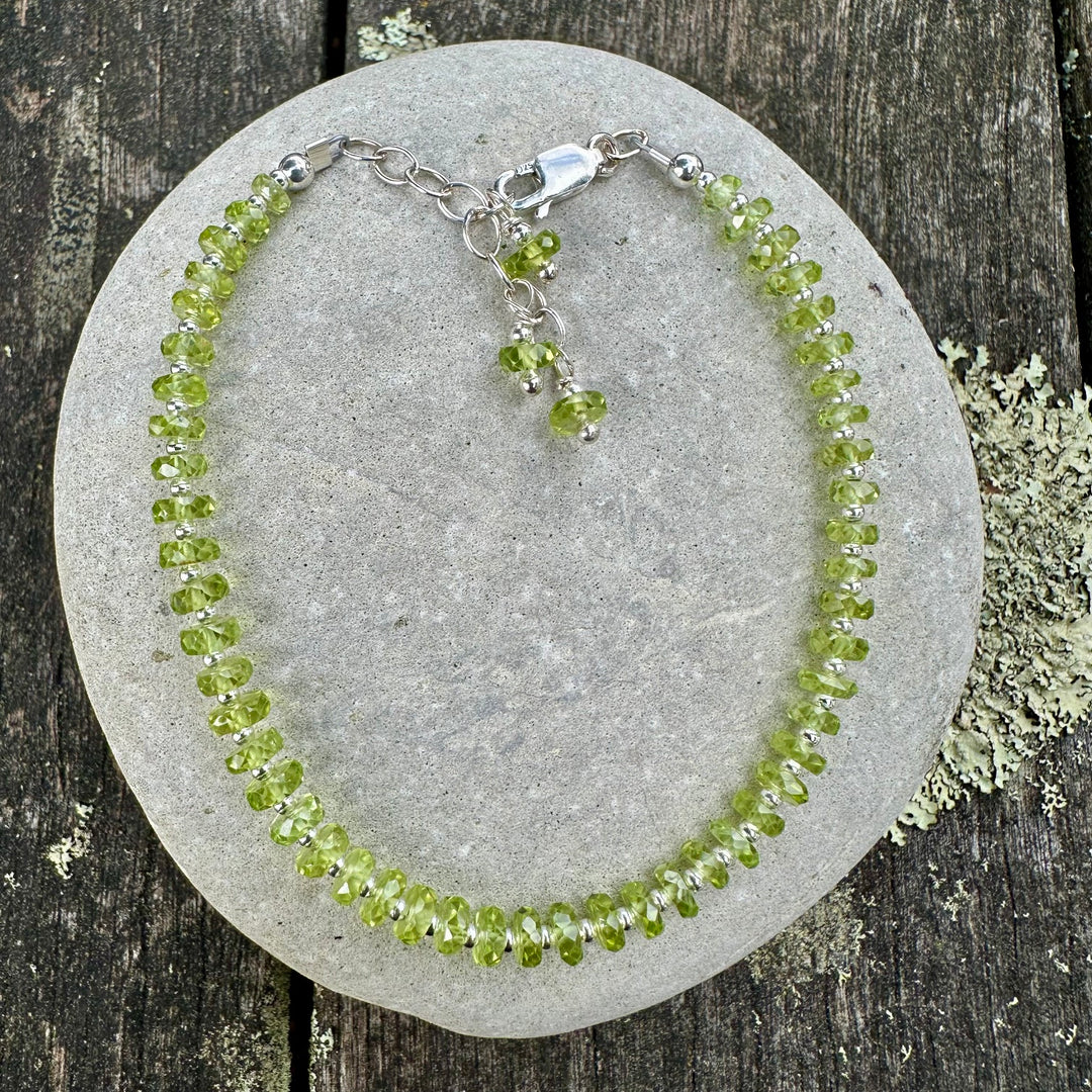 Faceted peridot rondel bracelet