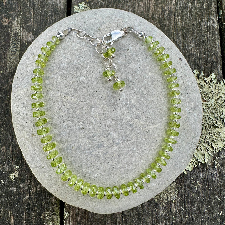 Faceted peridot rondel bracelet