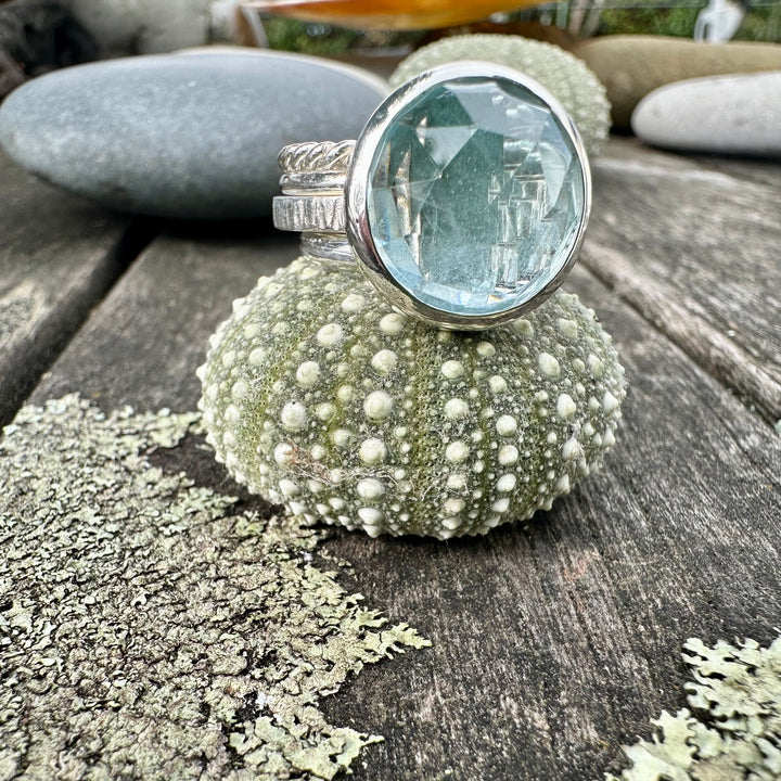Rose cut blue topaz unity ring