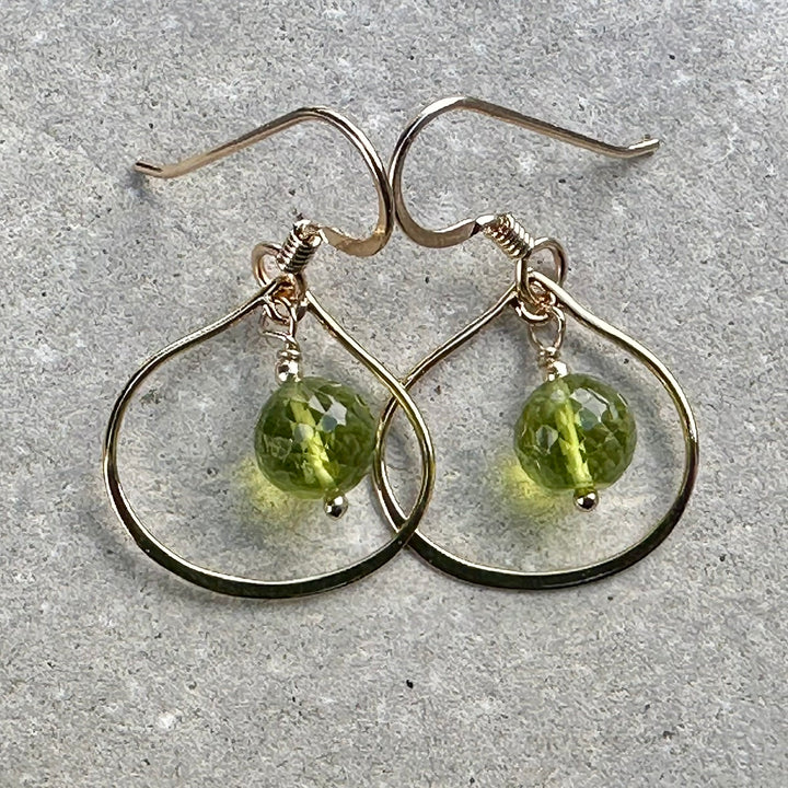 Faceted peridot in yellow gold fill arabesque fittings