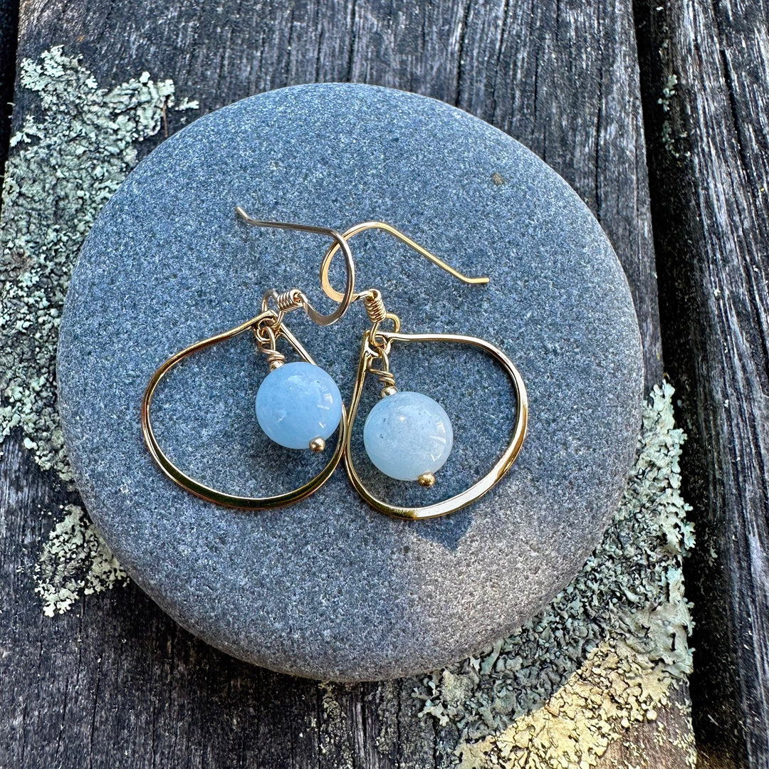 Aquamarine in small arabesque settings