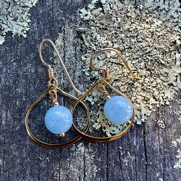 Aquamarine in small arabesque settings