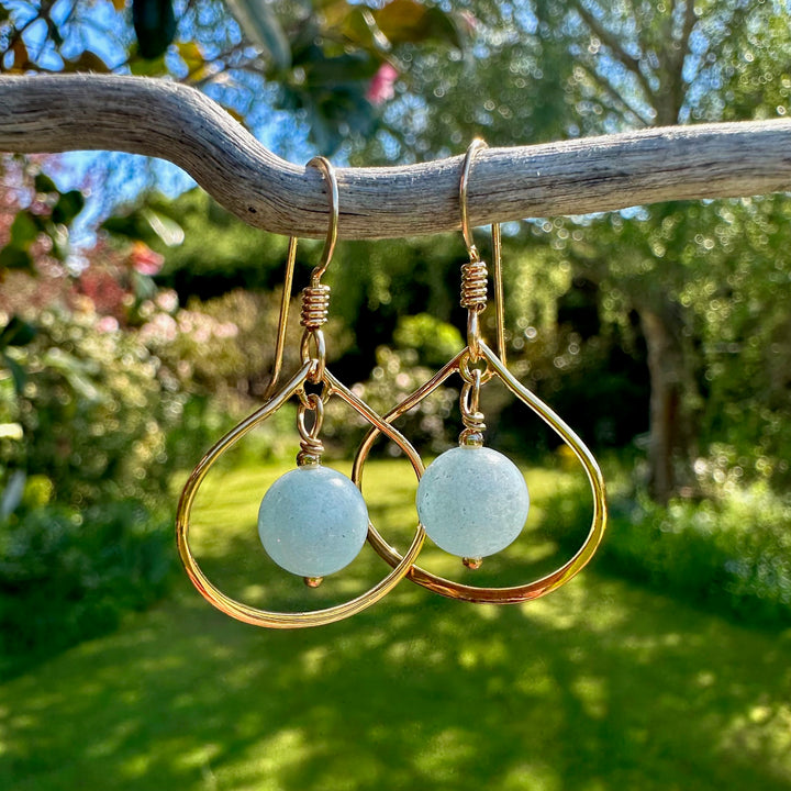 Aquamarine in small arabesque settings