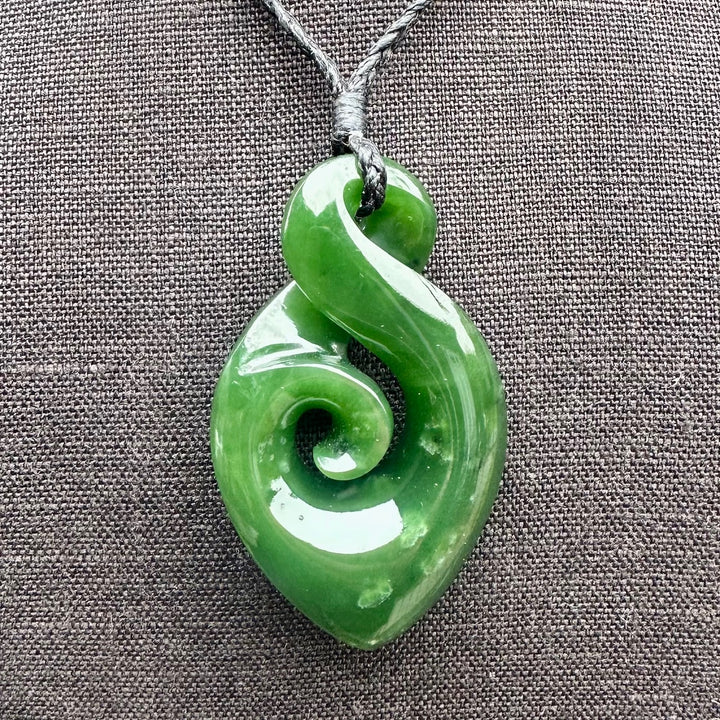 dark NZ greenstone rau kumara koru