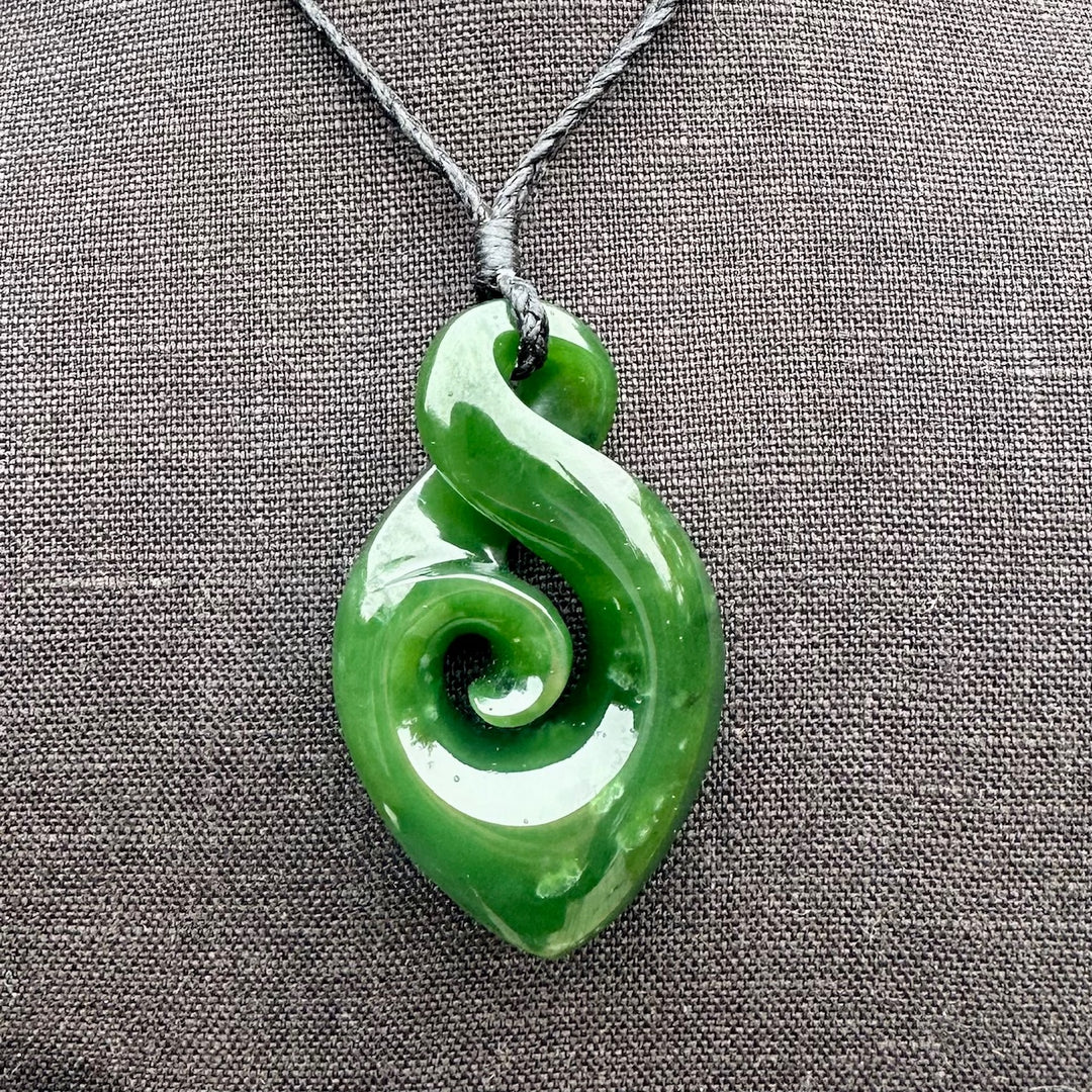 dark NZ greenstone rau kumara koru